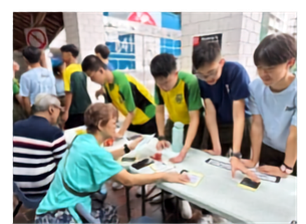 Secondary 4 Students advocating against E-Commerce Scams to the Public at Khatib Square.